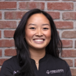 Dr. Olivia La, chiropractor at Precision Chiropractic and Combat Recovery Foundation strategic partner, smiling headshot
